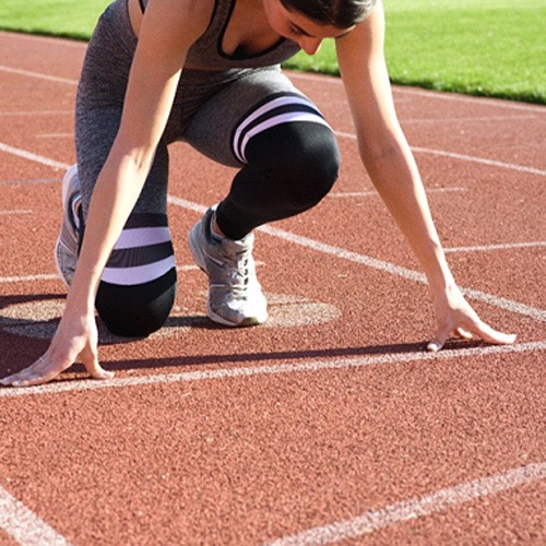 A girl preparing to run track