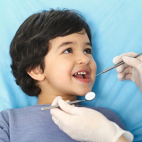 Young boy receiving a dental exam
