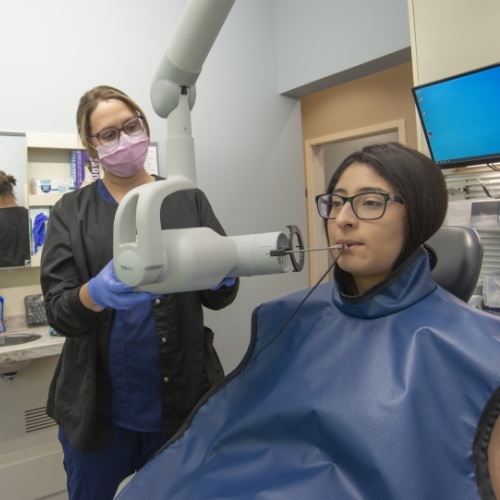 Woman receiving dental x-rays