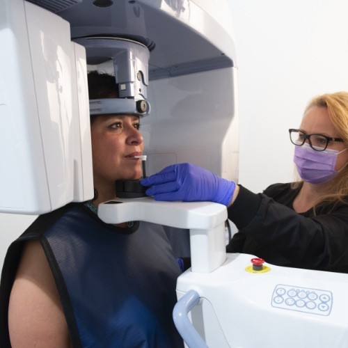 Patient receiving 3 D C T cone beam x-ray scans