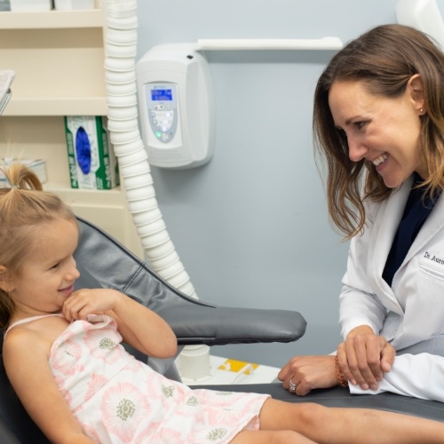 child undergoing fluoride treatment in Arlington Heights