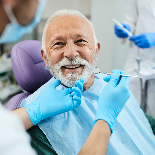 Man learning how dental implants work in Arlington Heights