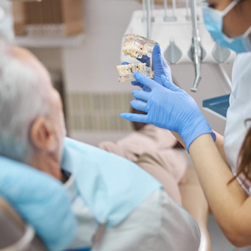 Man discussing need for dental bridges in Arlington Heights