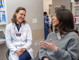 dentist showing a patient their dental X-rays