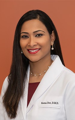 Headshot of Dr. Reena Dev, DMD