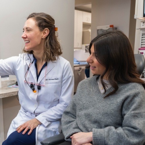Dentist talking to a patient about smile makeovers in Arlington Heights