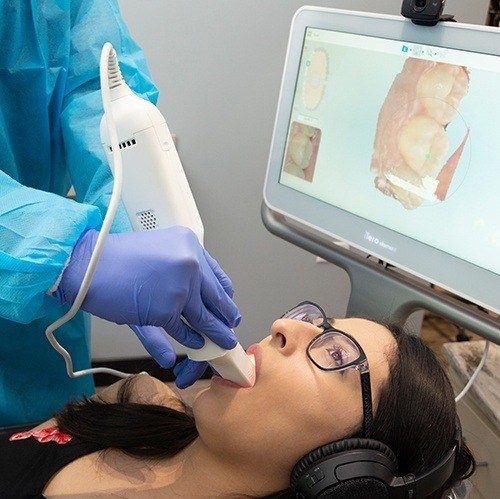 Woman having digital scans of her teeth taken