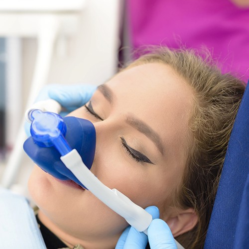 Close up of woman receiving nitrous oxide sedation