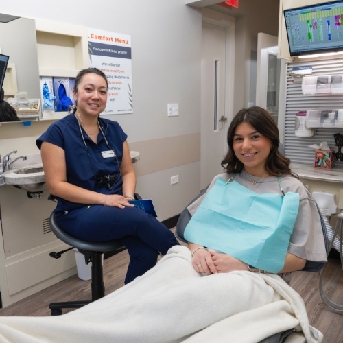 Woman grinning in dental chair