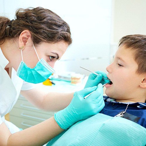 Young boy undergoing a dental checkup