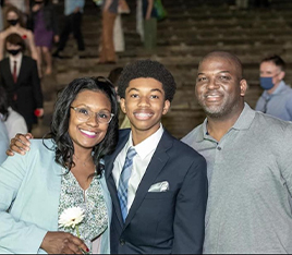 Doctor Christian with his wife and son in formal clothes