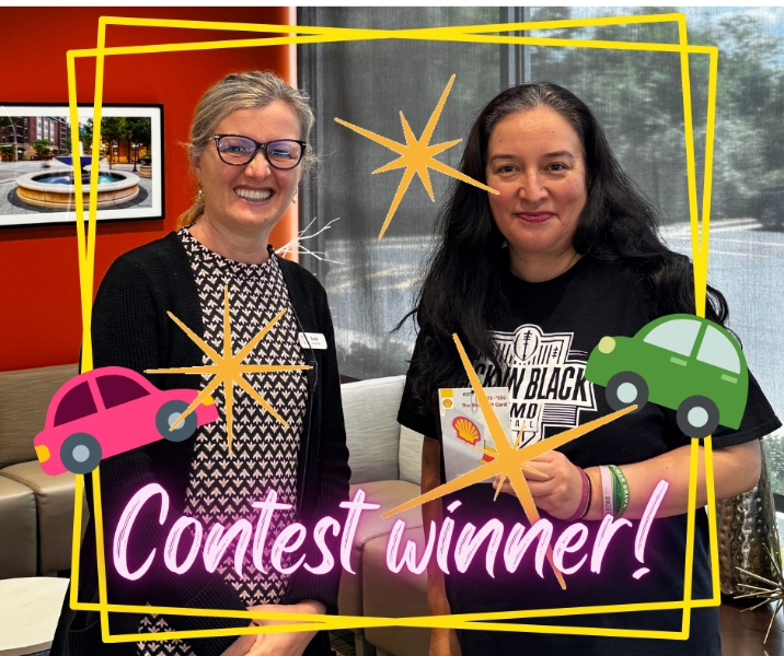 Dentist and patient smiling together