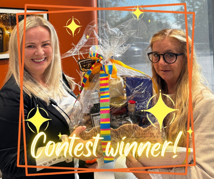 Dentist and patient smiling together