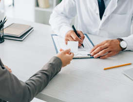 Patient paying for treatment with card 