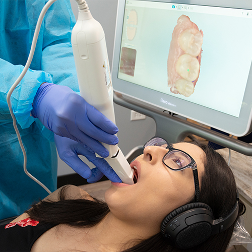 Dentist capturing intraoral images