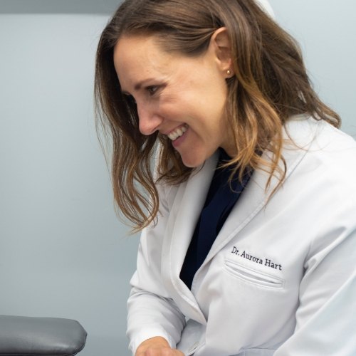 Dentist grinning at a patient