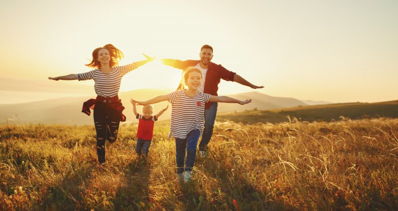 family of four having fun