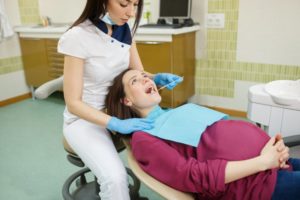 pregnant person at dentist