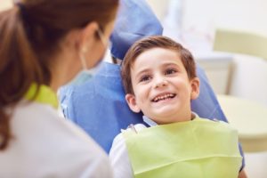 Boy smiling during visit with children’s dentist in Arlington Heights