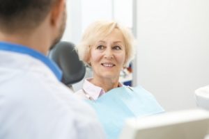 Woman smiling with dental implants