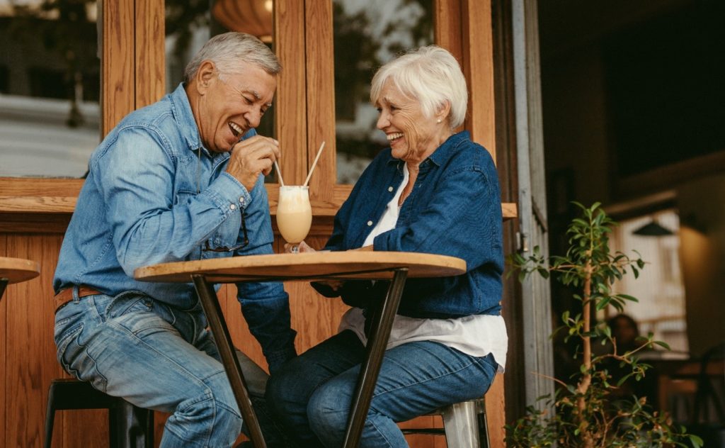 Mature couple smiling on date